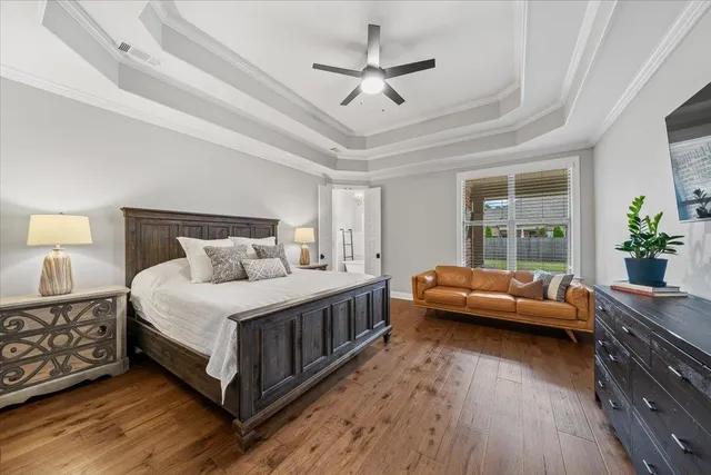 a bed room with a bed and a couch