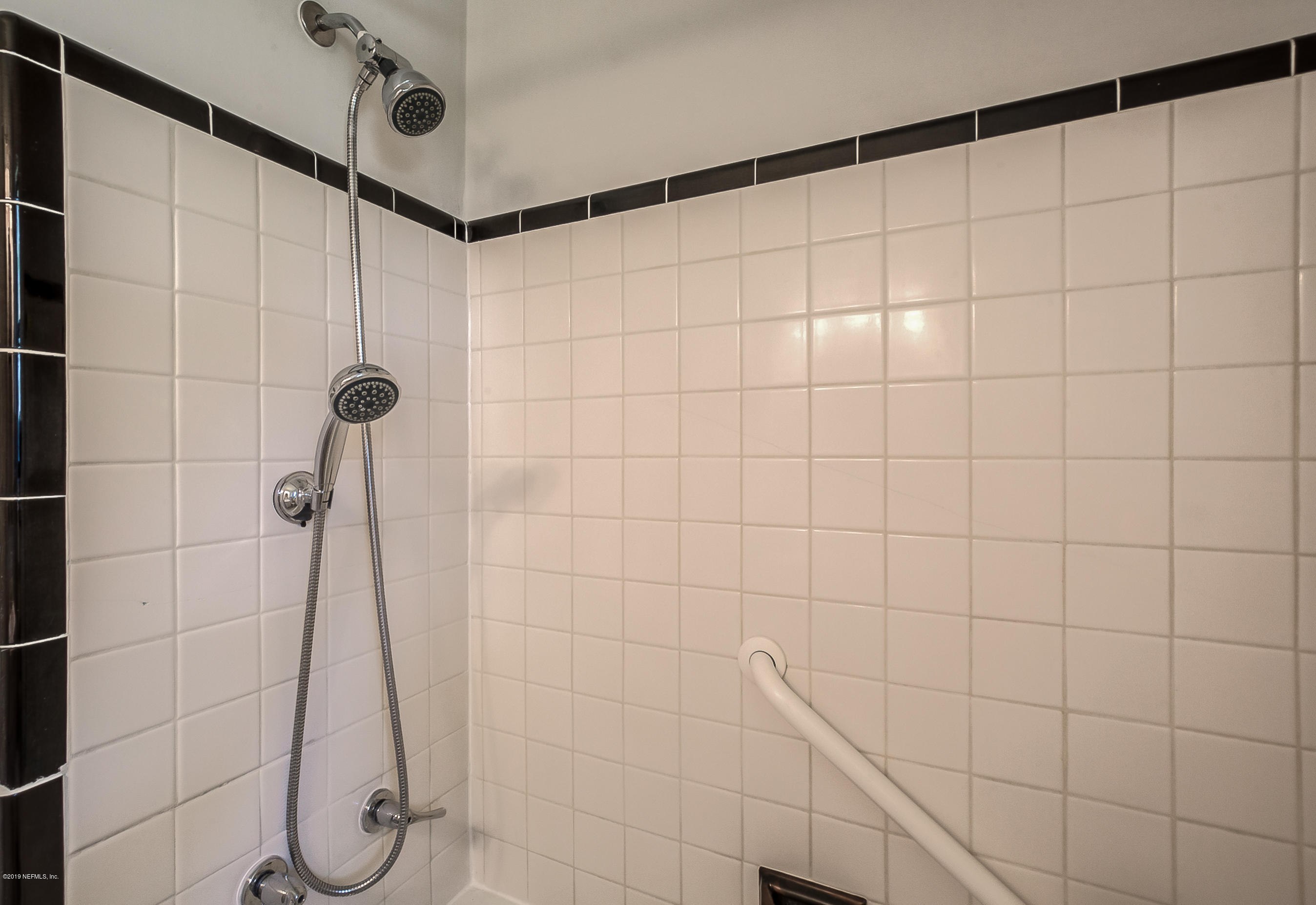 4548 Milstead Road Jacksonville, FL 32210 - Photo 30 of 37 a bathroom with a shower