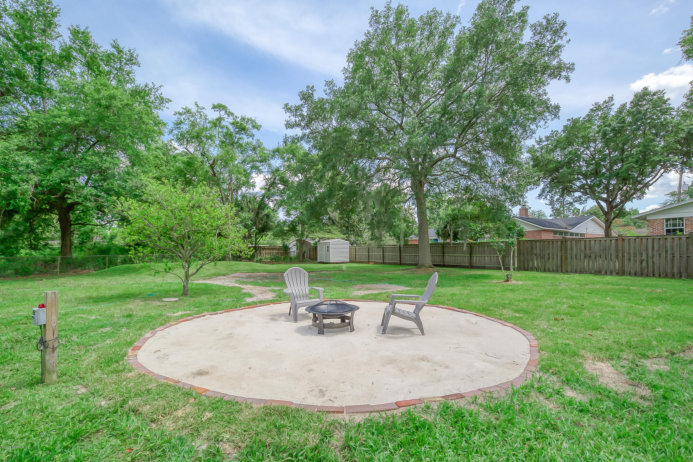 4548 Milstead Road Jacksonville, FL 32210 - Photo 7 of 37 a view of a park with a slide