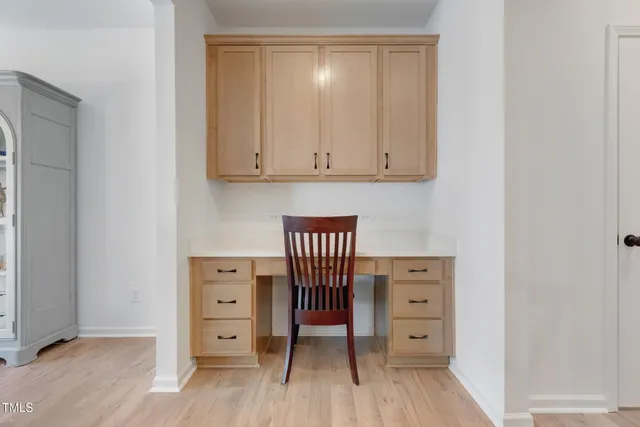 wooden floor and cabinet in a room