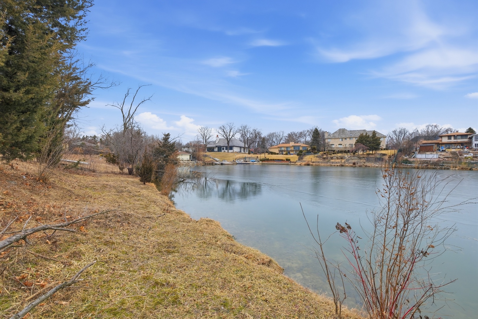2149 Post Road Northbrook, IL 60062 - Photo 4 of 15 a view of a lake with houses in the back