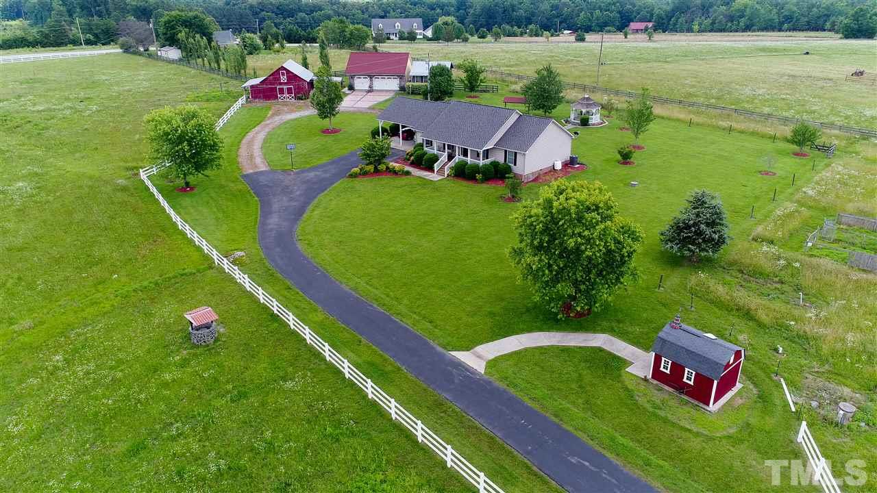 3540 Antioch Church Road Timberlake, NC 27583 - Photo 1 of 25 a view of a play ground with a table and a chairs
