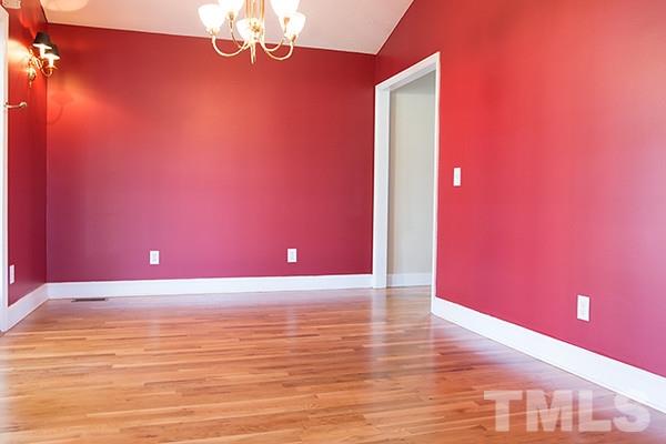 3540 Antioch Church Road Timberlake, NC 27583 - Photo 11 of 25 a view of empty room with wooden floor