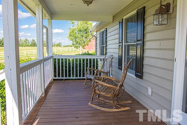 3540 Antioch Church Road Timberlake, NC 27583 - Photo 8 of 25 a view of two chairs in the balcony