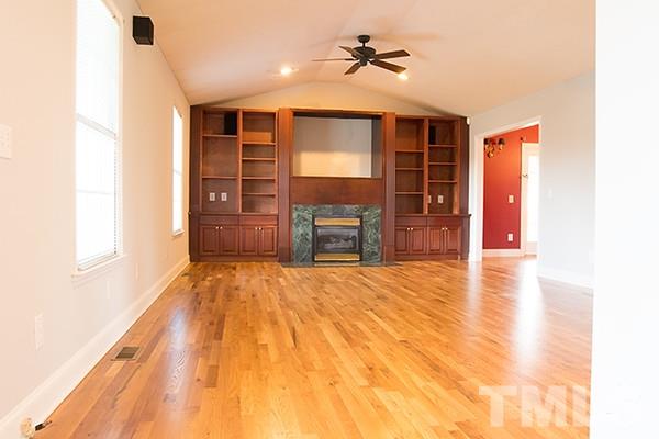 3540 Antioch Church Road Timberlake, NC 27583 - Photo 9 of 25 a view of empty room with a fireplace and cabinet