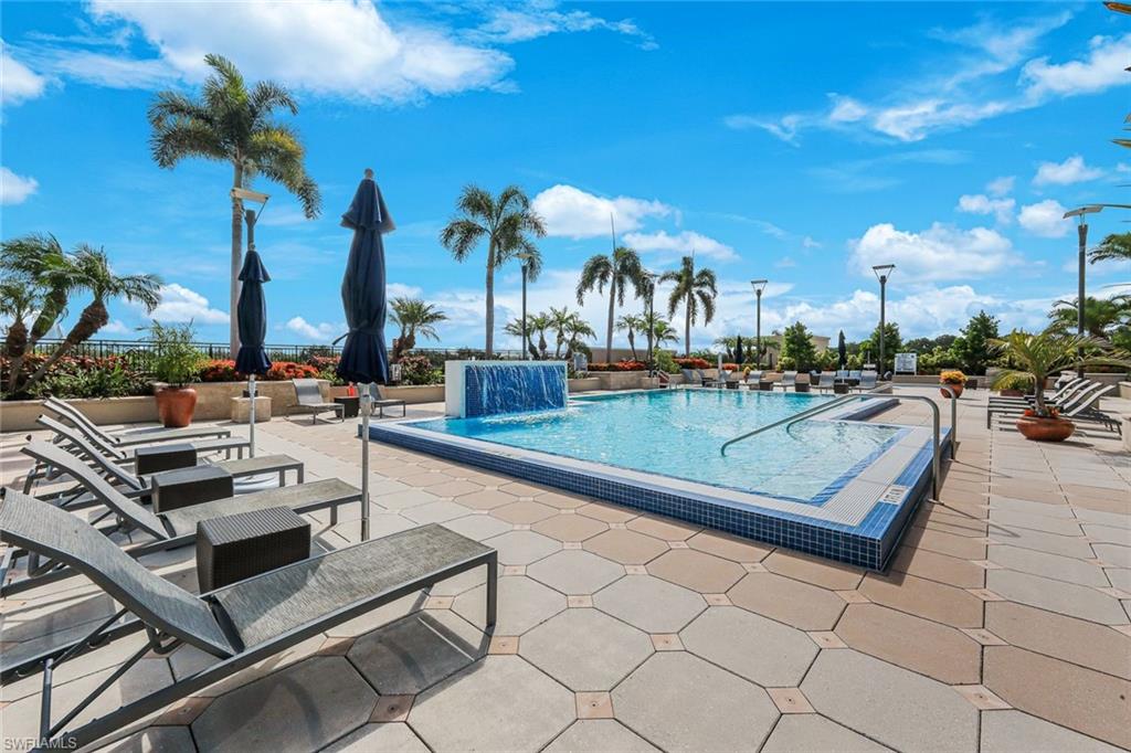 9123 Strada Place, Unit 7201 Naples, FL 34108 - Photo 34 of 50 a view of a patio with swimming pool