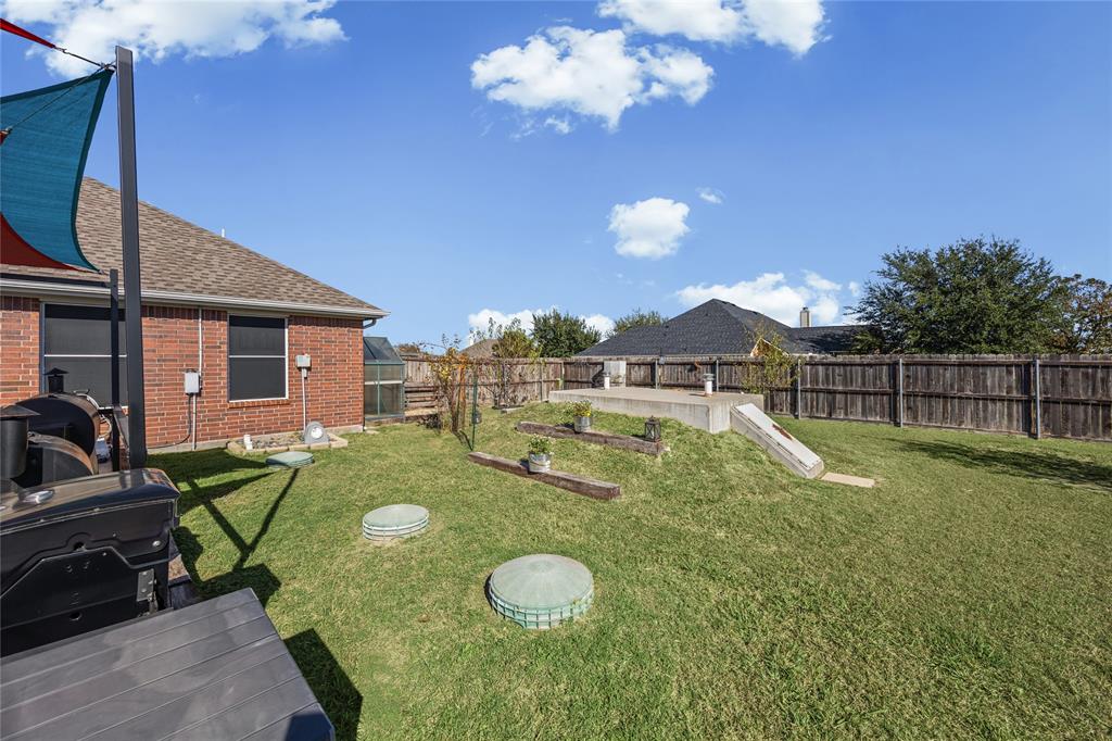 112 Springfield Lane Red Oak, TX 75165 - Photo 34 of 40 a view of a house with backyard