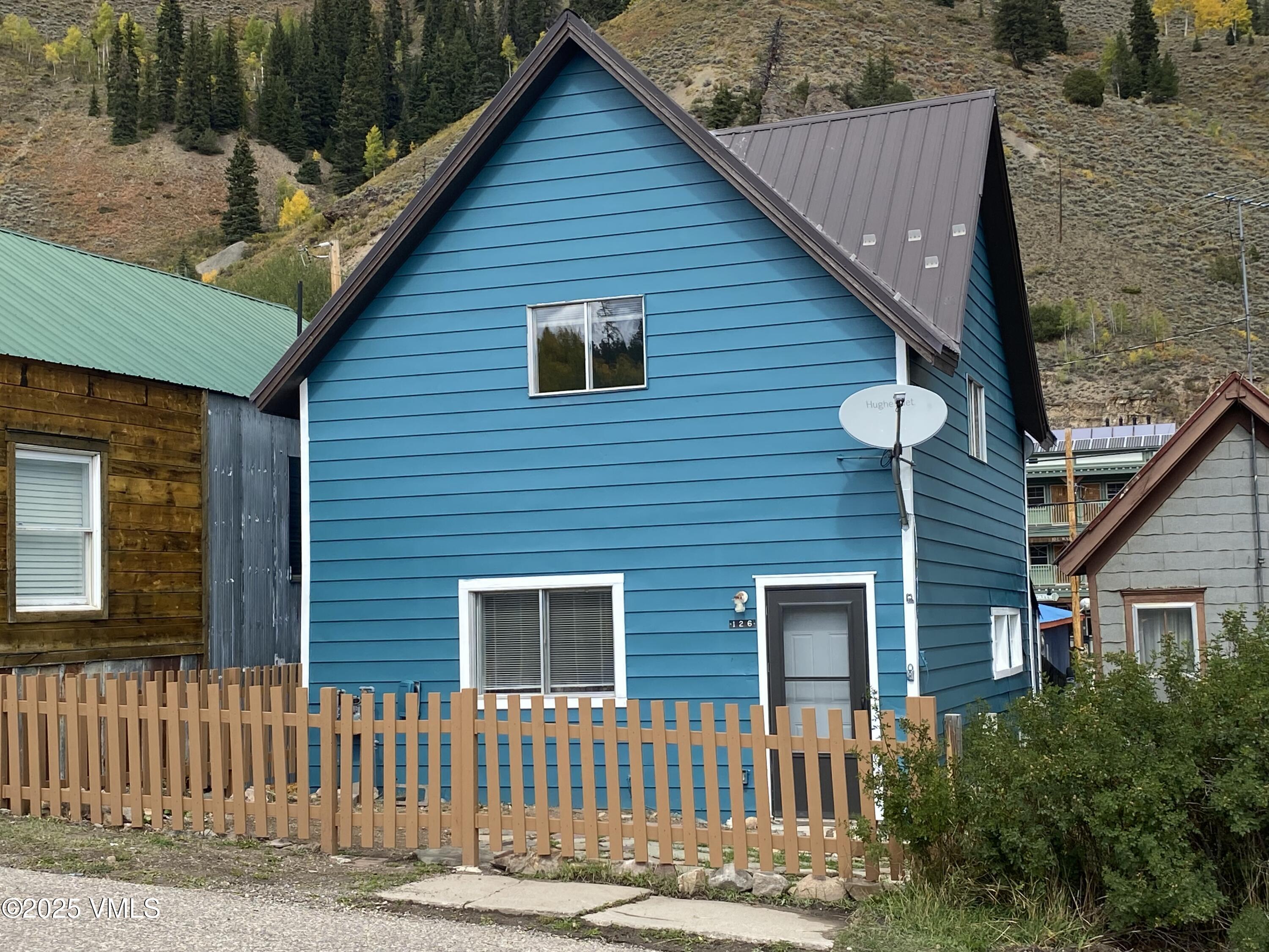 a front view of a house with a garage