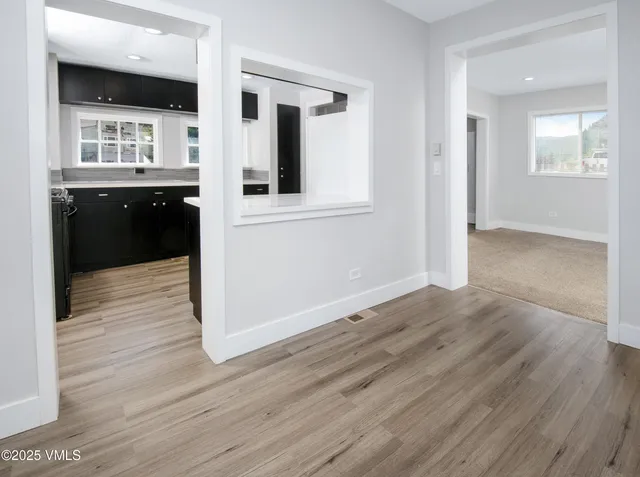 a view of a kitchen cabinets and a kitchen counter space