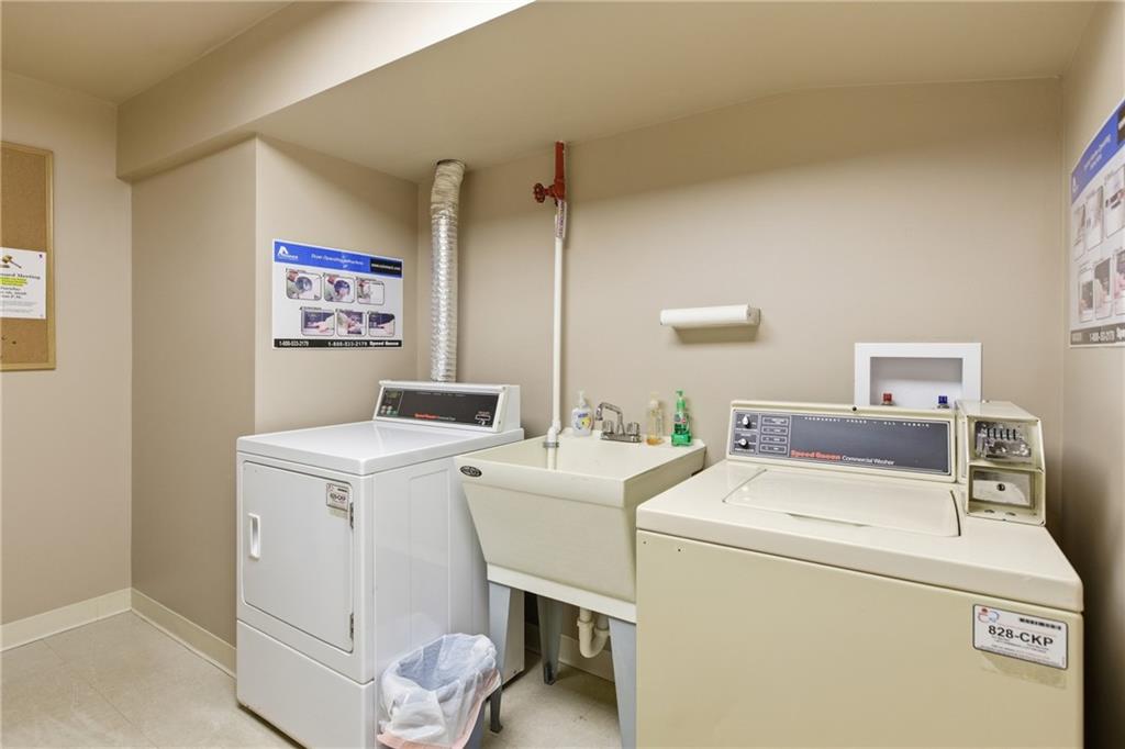 750 Washington Road, Unit 307 Pittsburgh, PA 15228 - Photo 22 of 24 a utility room with dryer and washer