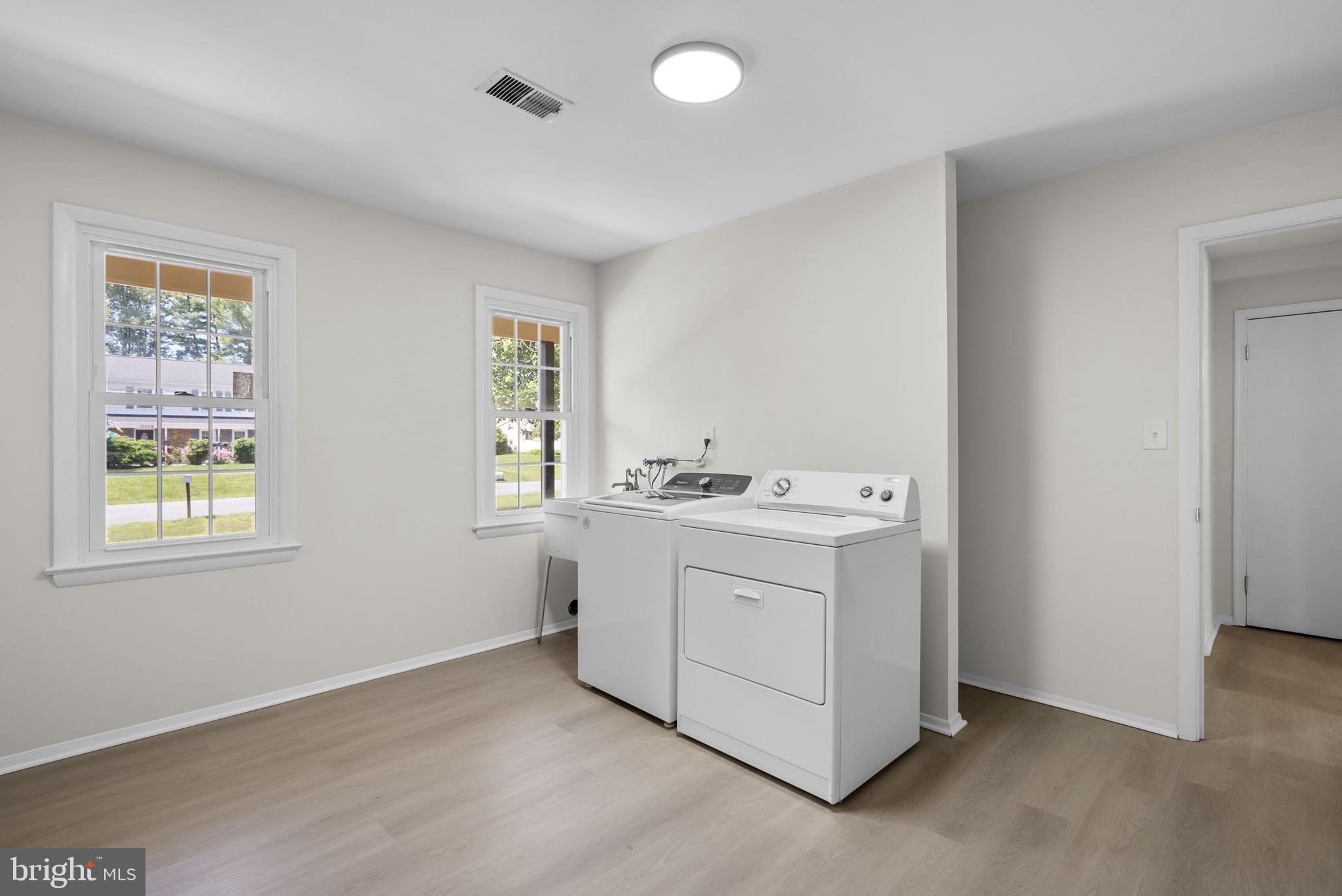 17109 Oxley Farm Road Poolesville, MD 20837 - Photo 32 of 43 Main level laundry mudroom