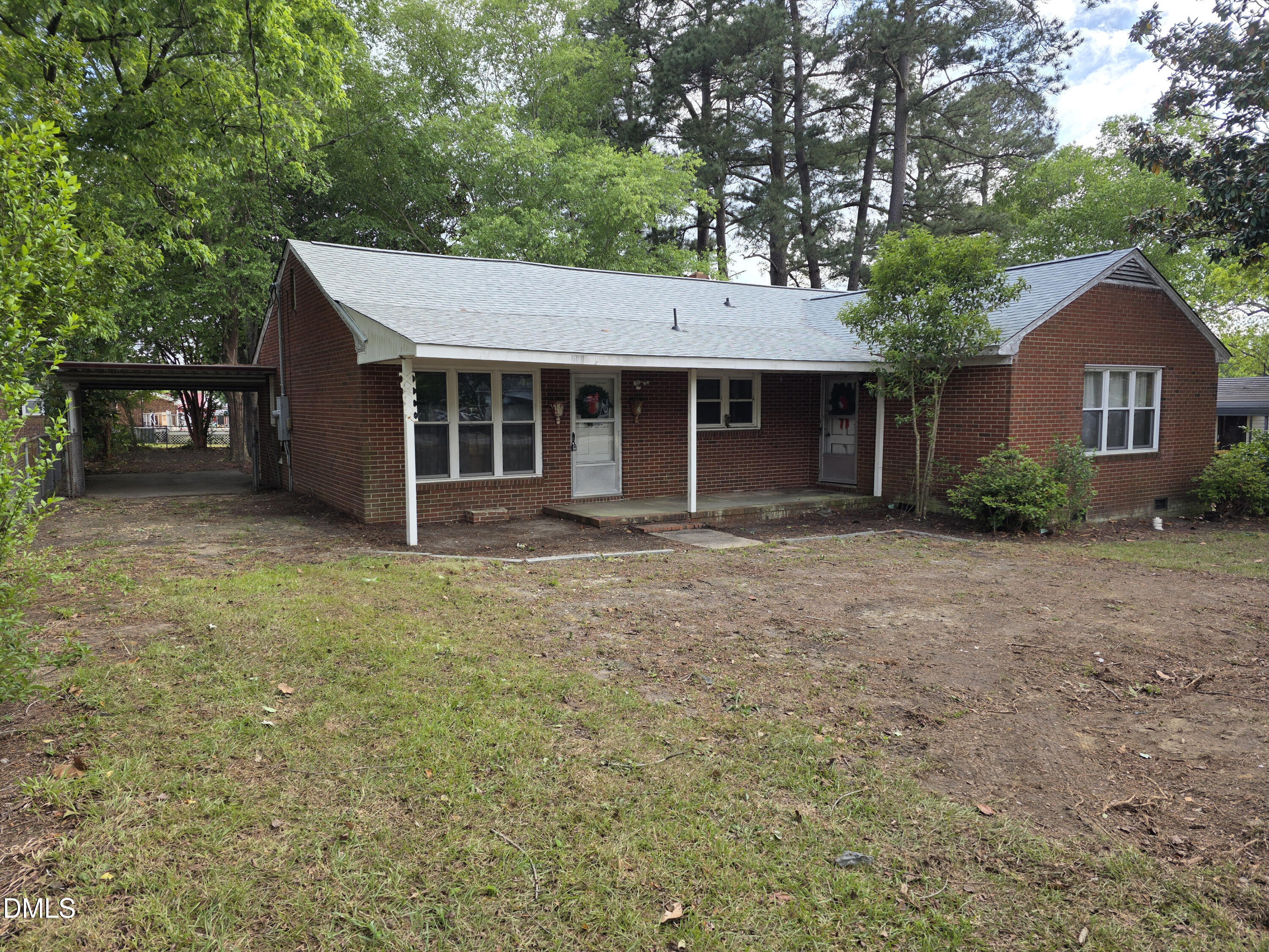 1305 Erwin Road Dunn, NC 28334 - Photo 1 of 37 20260426_172812