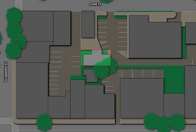 a kitchen with stainless steel appliances kitchen island granite countertop a refrigerator and microwave