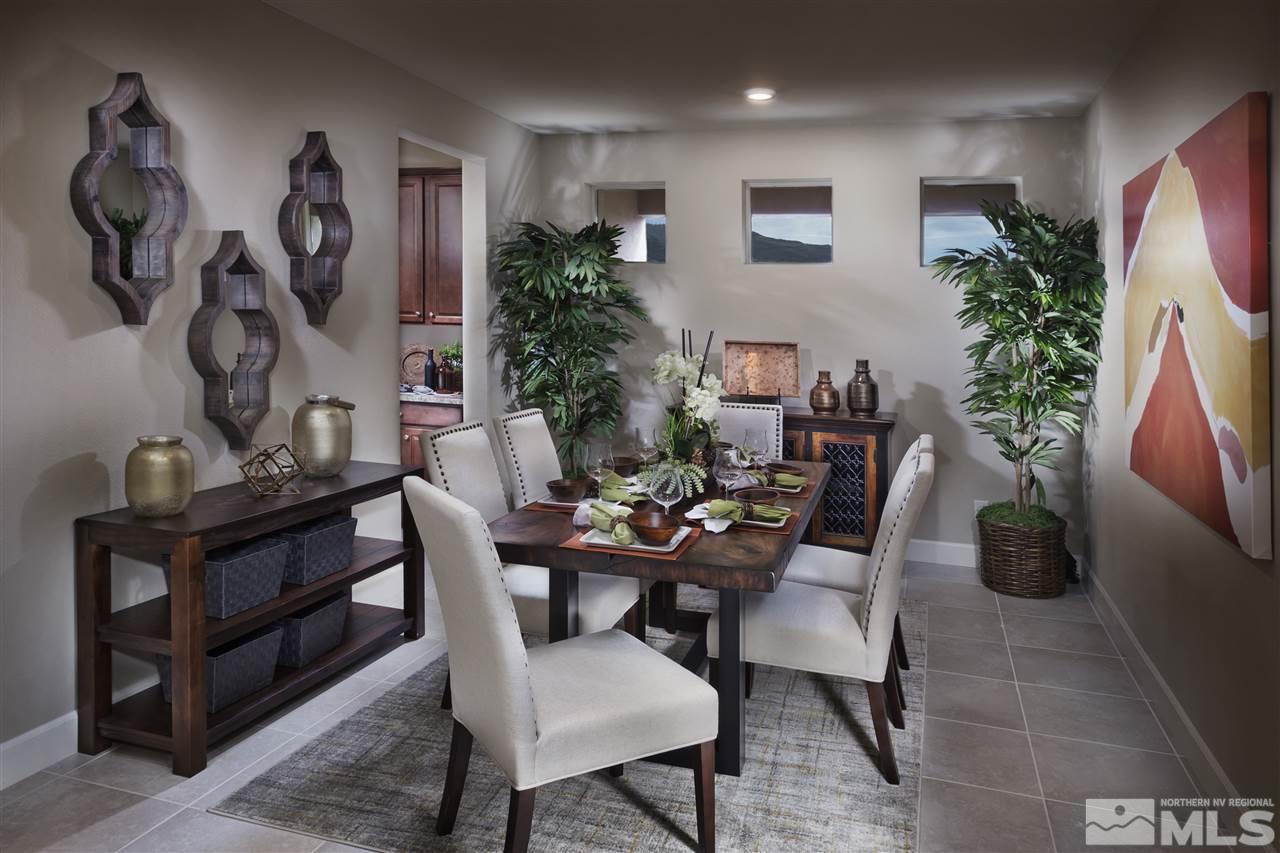 10270 Rollins Drive Reno, NV 89521 - Photo 4 of 6 a view of a dining room with furniture and a potted plant