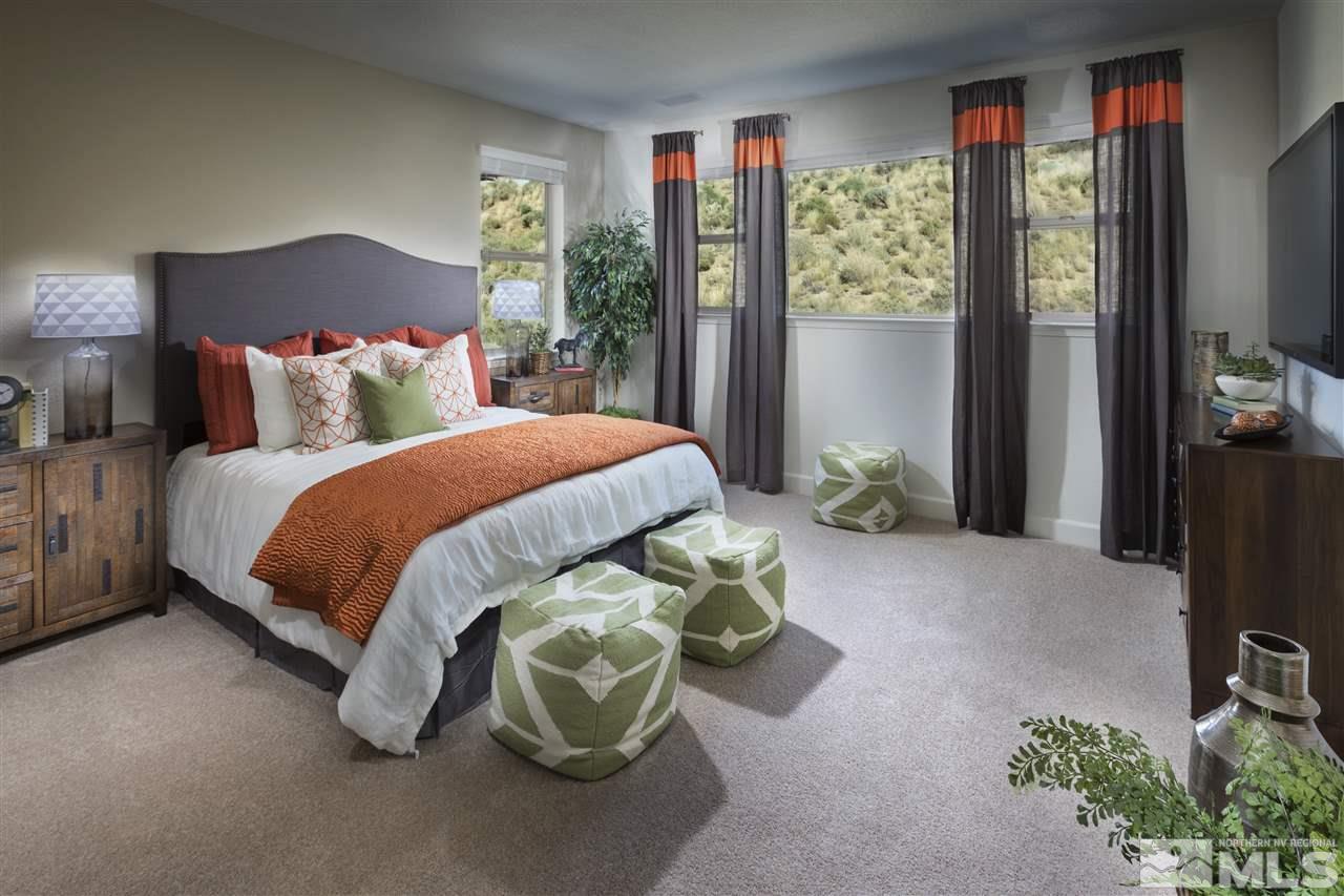 10270 Rollins Drive Reno, NV 89521 - Photo 5 of 6 a bedroom with a bed and window