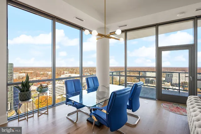 a view of a dining room with furniture window and outside view
