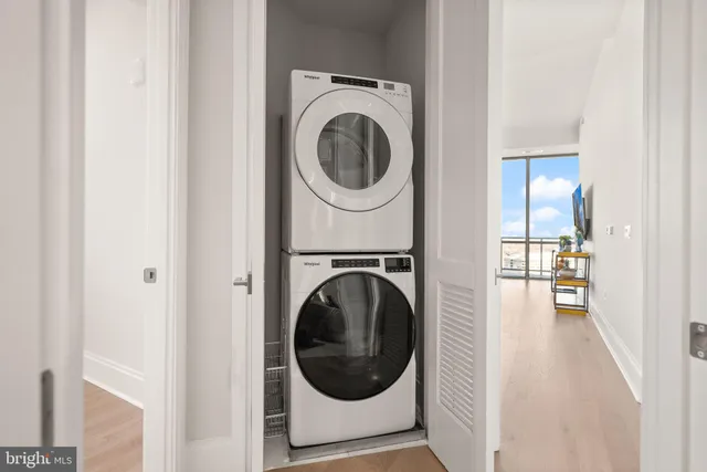 a bathroom with a double vanity sink and mirror