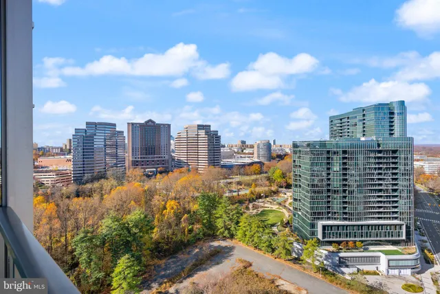 a room with gym equipment and large window