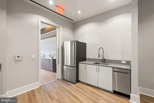 a view of a swimming pool with a lounge chairs