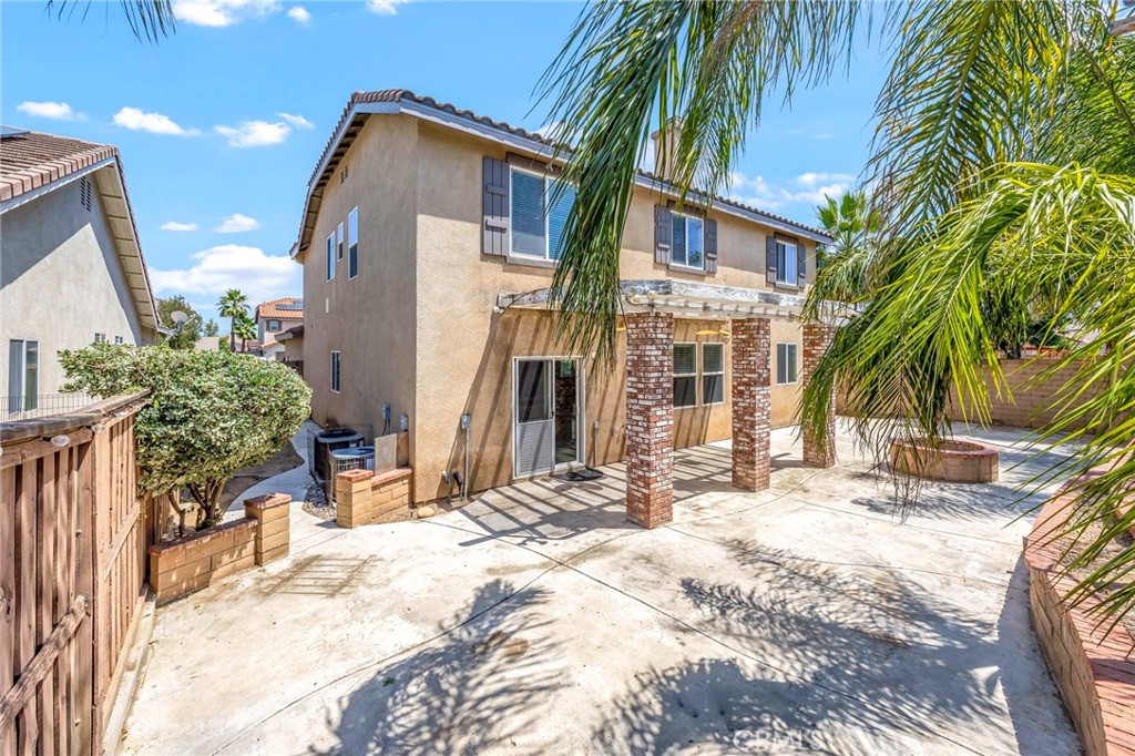 151 Ropango Way Hemet, CA 92545 - Photo 23 of 28 a view of a building with a yard