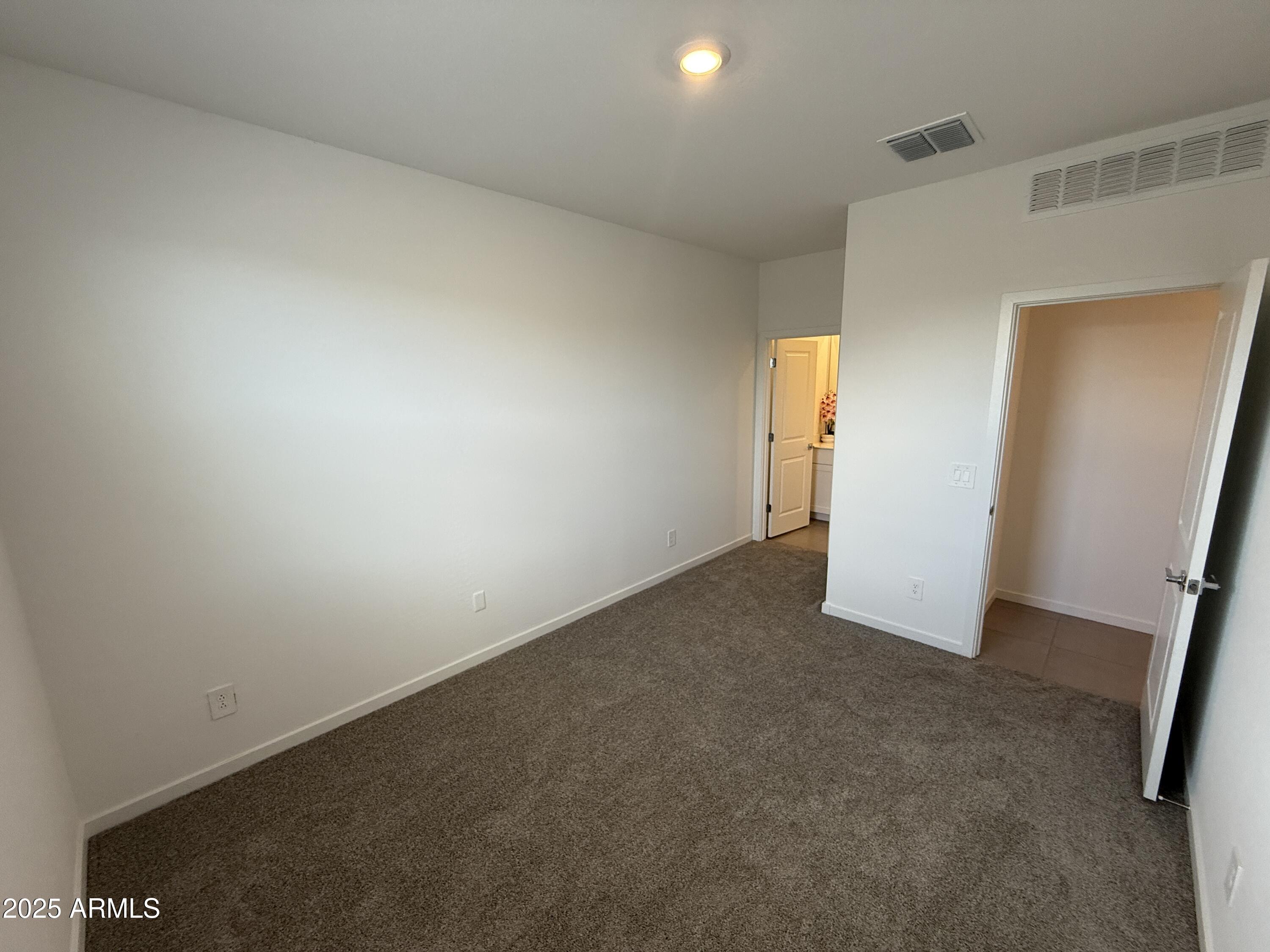 8534 West Warner Street Tolleson, AZ 85353 - Photo 28 of 36 an empty room with window