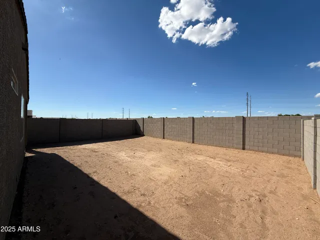 a view of kitchen and hall with wooden floor