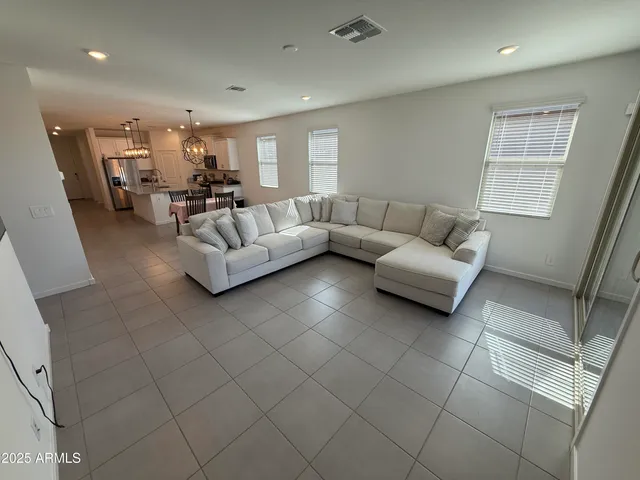 a living room with furniture and a couch