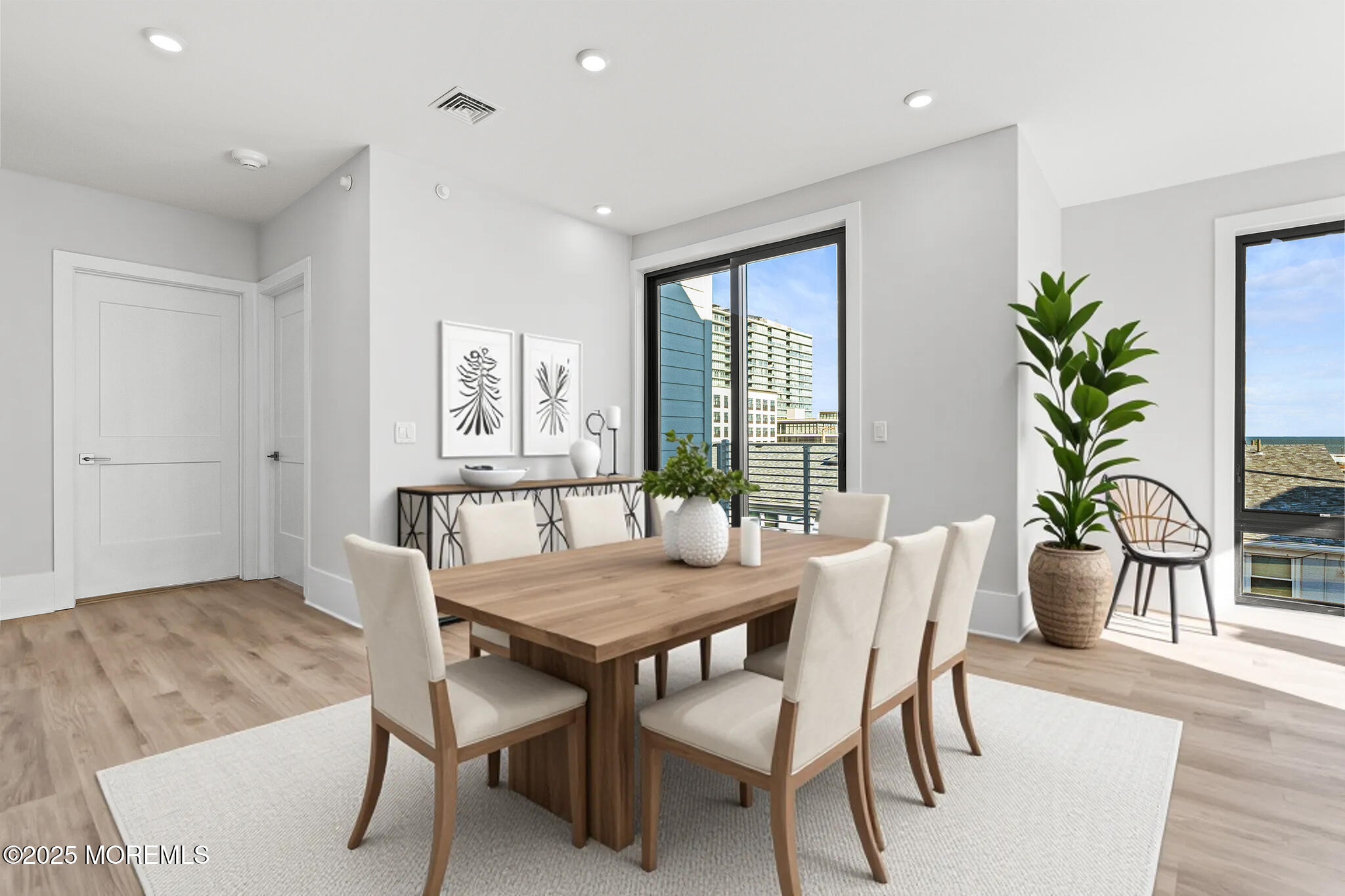 218 3rd Avenue, Unit 306 Asbury Park, NJ 07712 - Photo 21 of 66 a dining room with furniture and window