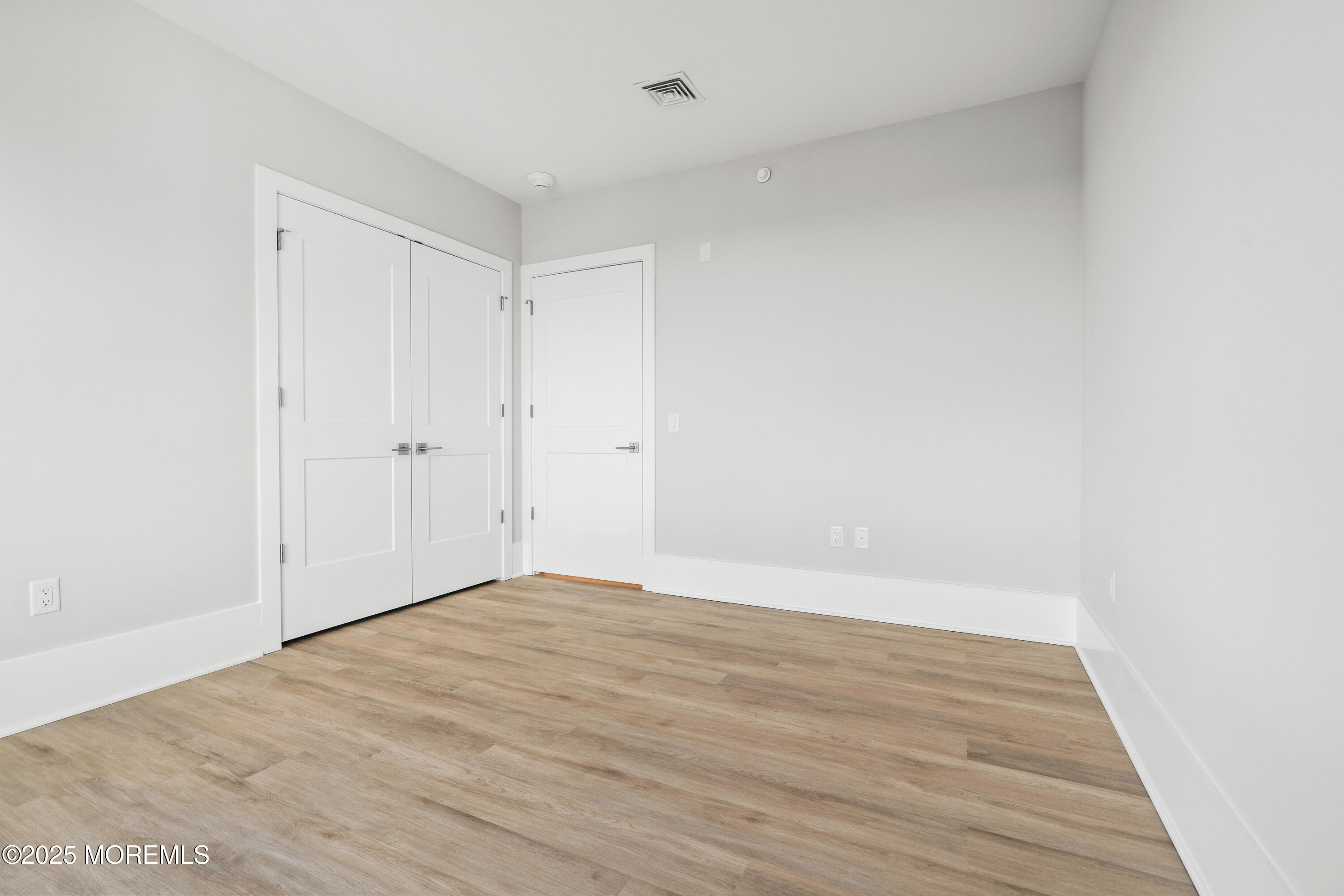 218 3rd Avenue, Unit 306 Asbury Park, NJ 07712 - Photo 31 of 66 a view of an empty room