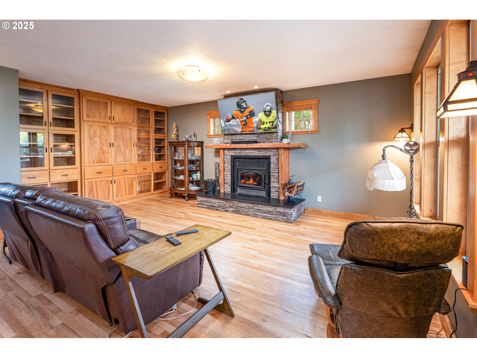 3215 54th Avenue Northeast Albany, OR 97321 - Photo 12 of 45 a living room with furniture and a fireplace