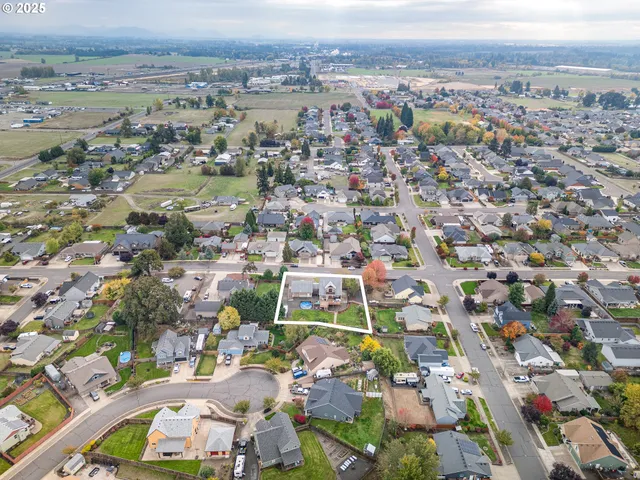 an aerial view of a city with lots of residential buildings