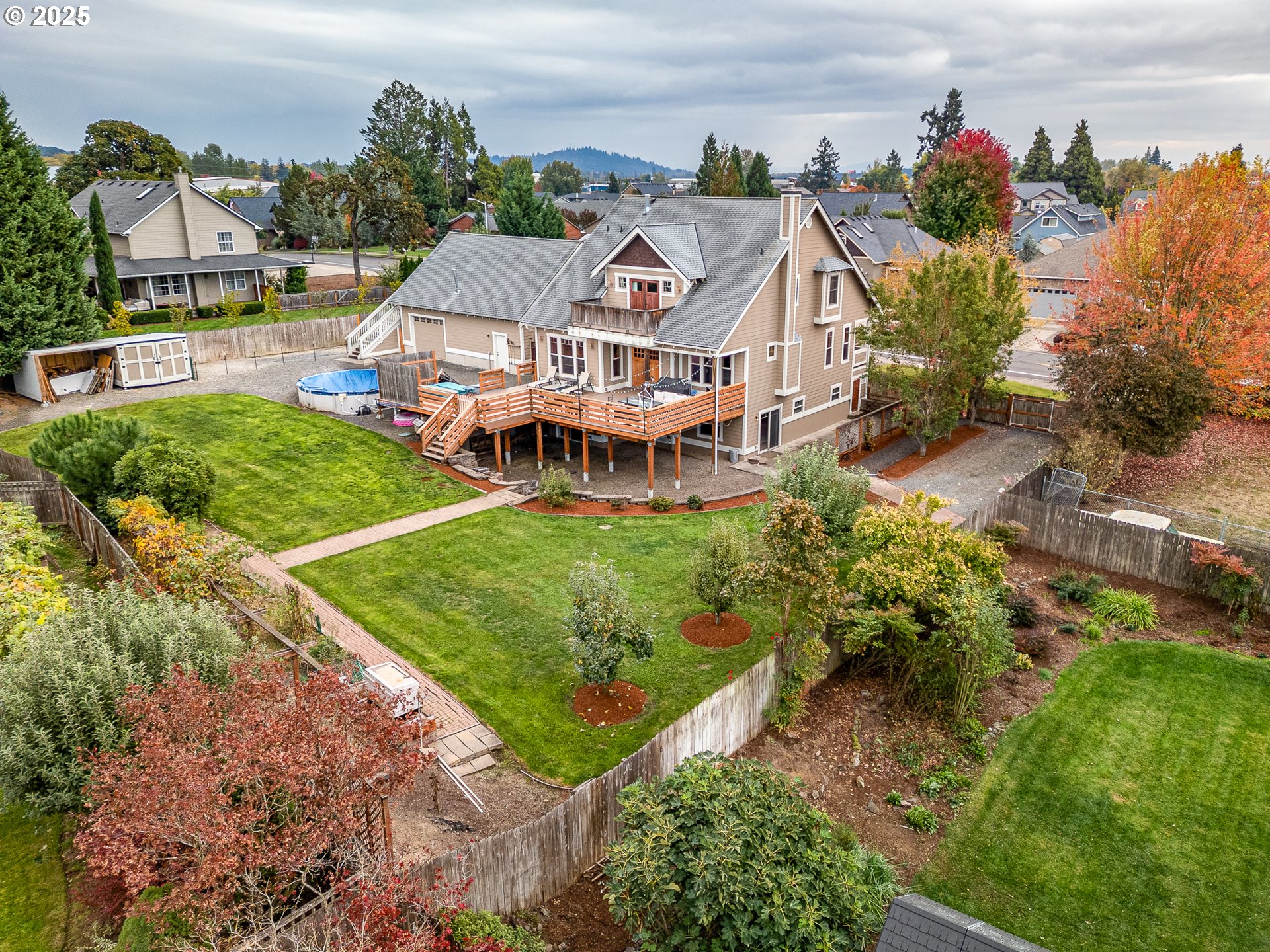 3215 54th Avenue Northeast Albany, OR 97321 - Photo 8 of 45 an aerial view of a house with a garden and plants