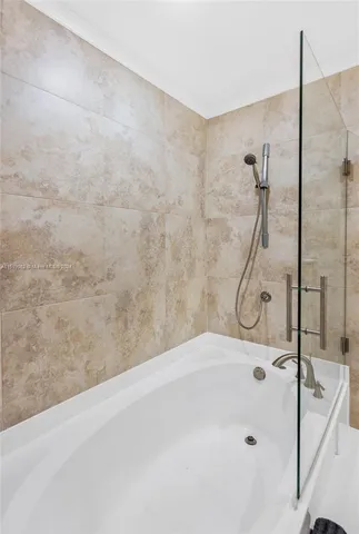 a bathroom with a bathtub