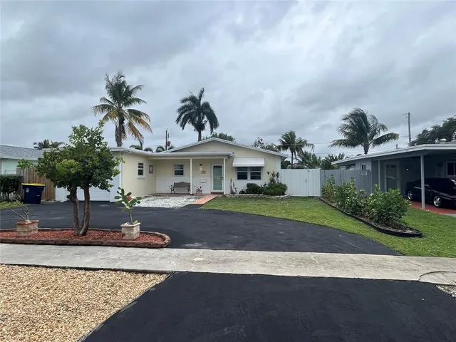 a view of storage and utility room with racks on the wall