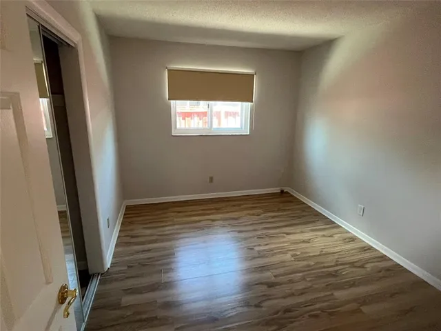 a bathroom with a sink a toilet a bathtub and shower