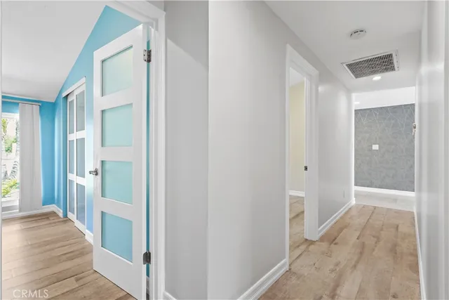 a view of backyard with a table and chairs