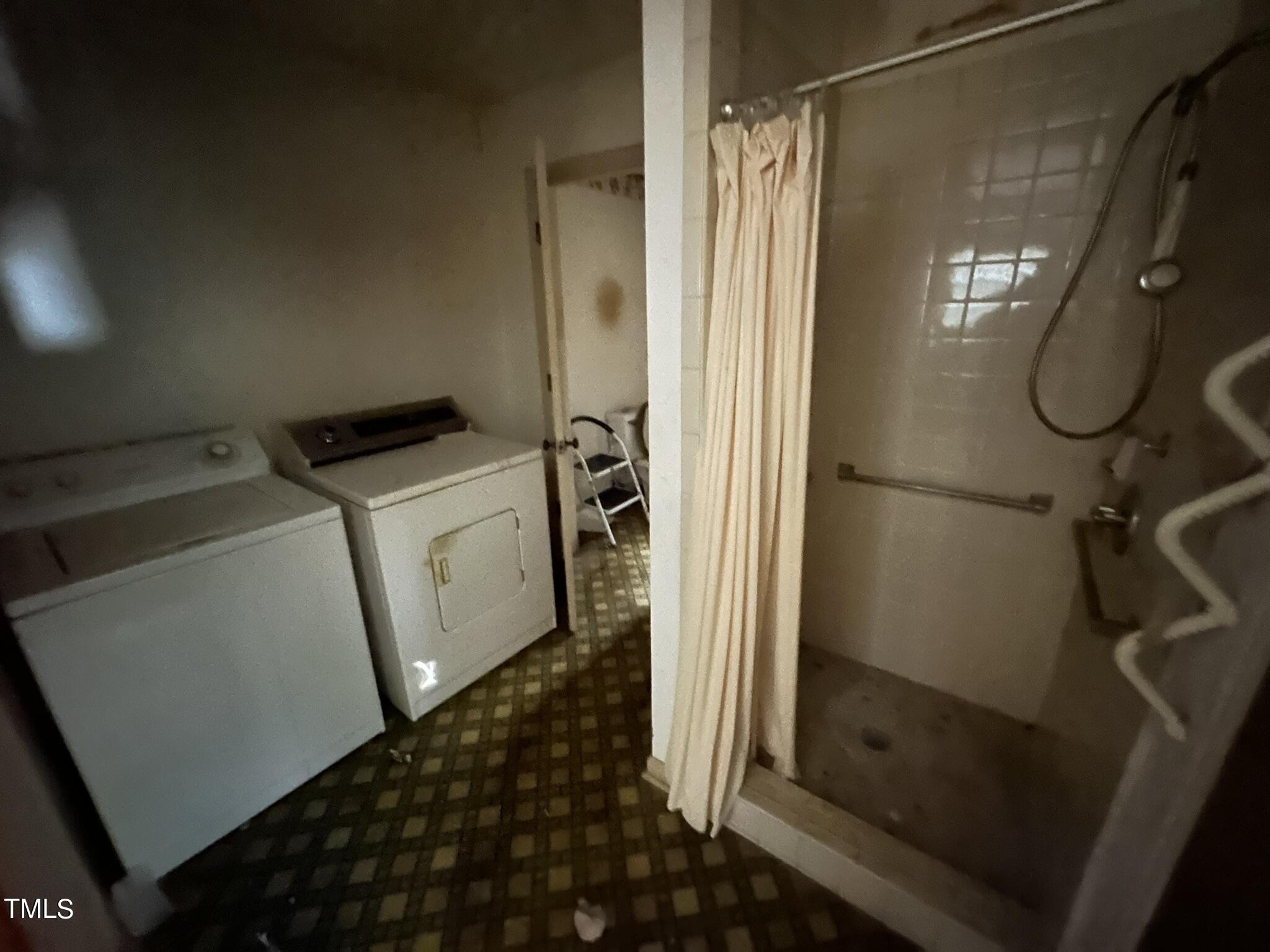 293 Nicholson Road Rockingham, NC 28379 - Photo 19 of 55 a bathroom with a shower and a sink