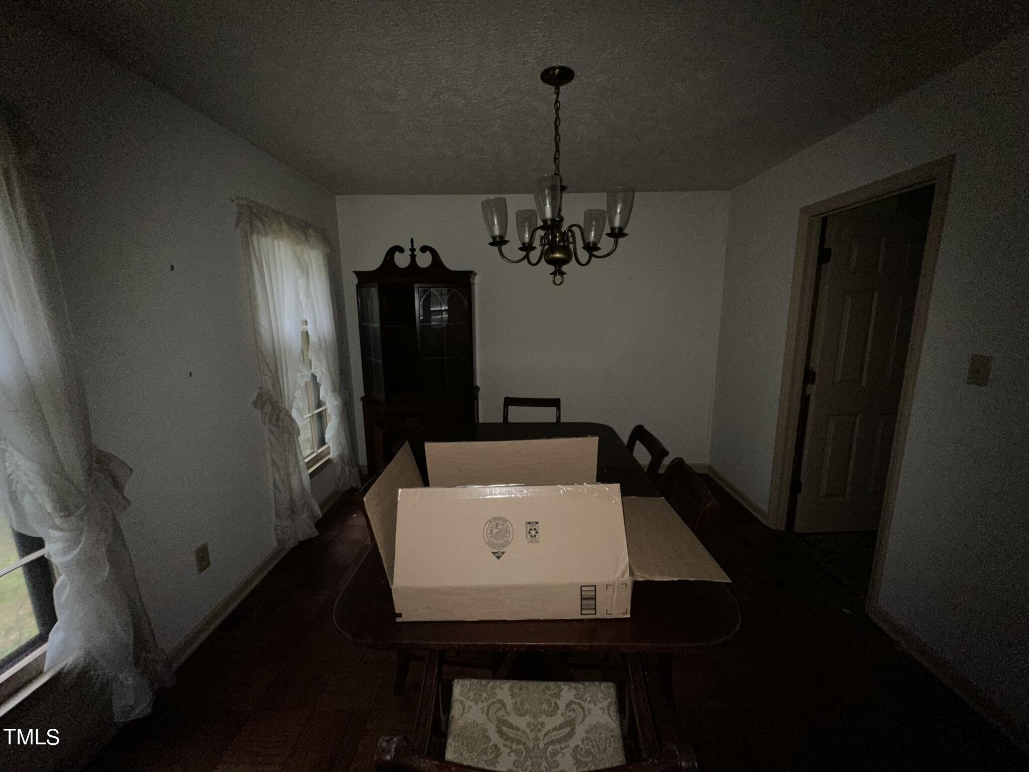 293 Nicholson Road Rockingham, NC 28379 - Photo 32 of 55 a room with a table chairs and entryway