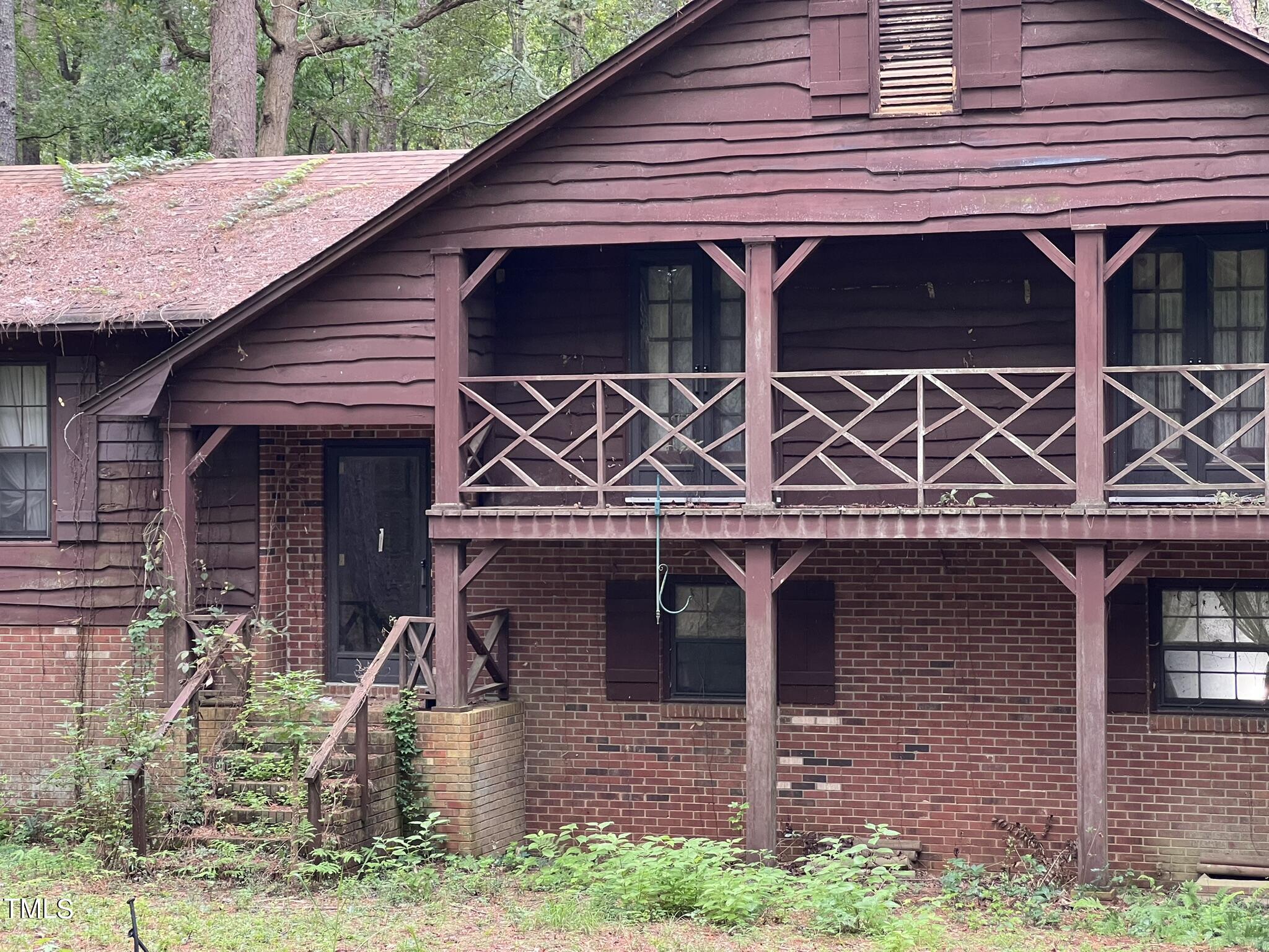 293 Nicholson Road Rockingham, NC 28379 - Photo 55 of 55 a front view of a house with garden