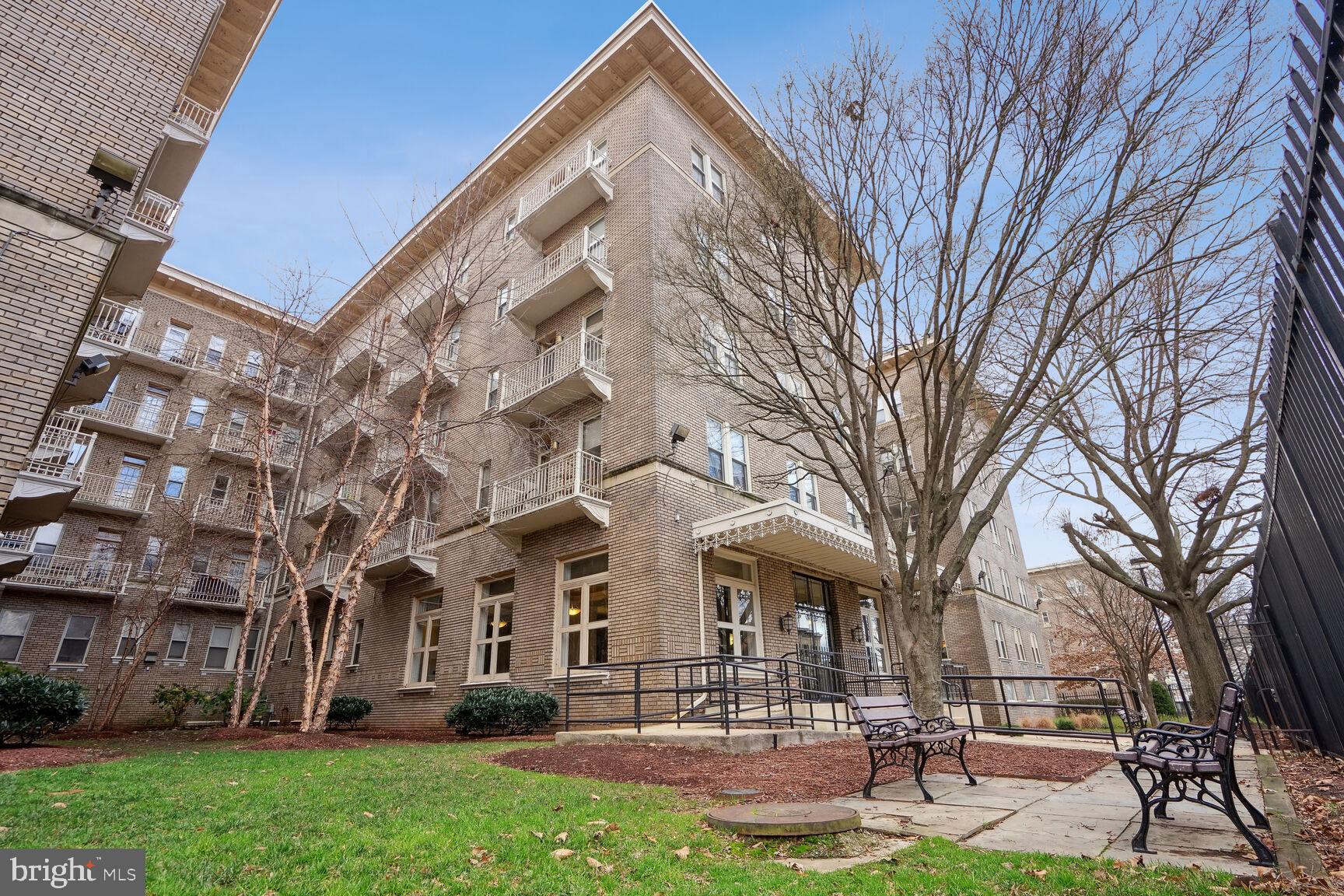 1308 Clifton Street Northwest, Unit 104 Washington, DC 20009 - Photo 24 of 24 a building view with outdoor space