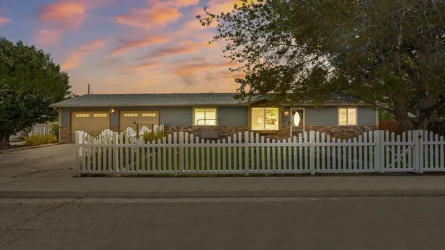 a front view of a house having garden