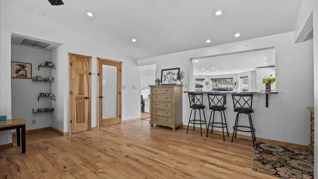 a view of a livingroom with furniture and windows