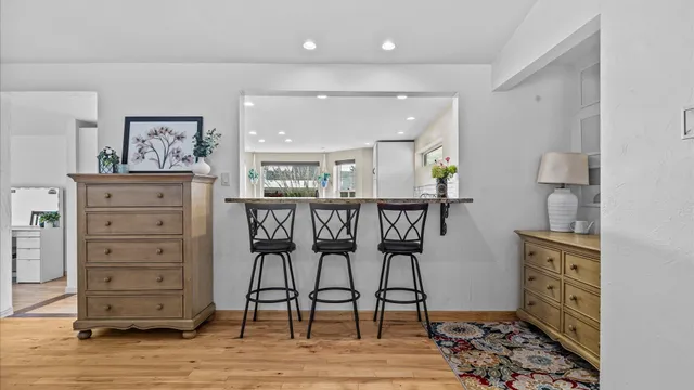 a view of a livingroom with furniture and window