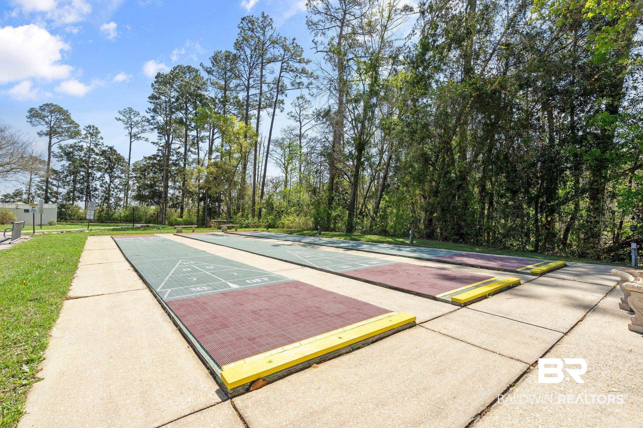 1325 Ridgewood Drive Lillian, AL 36549 - Photo 30 of 32 View of home's community featuring shuffleboard and a yard