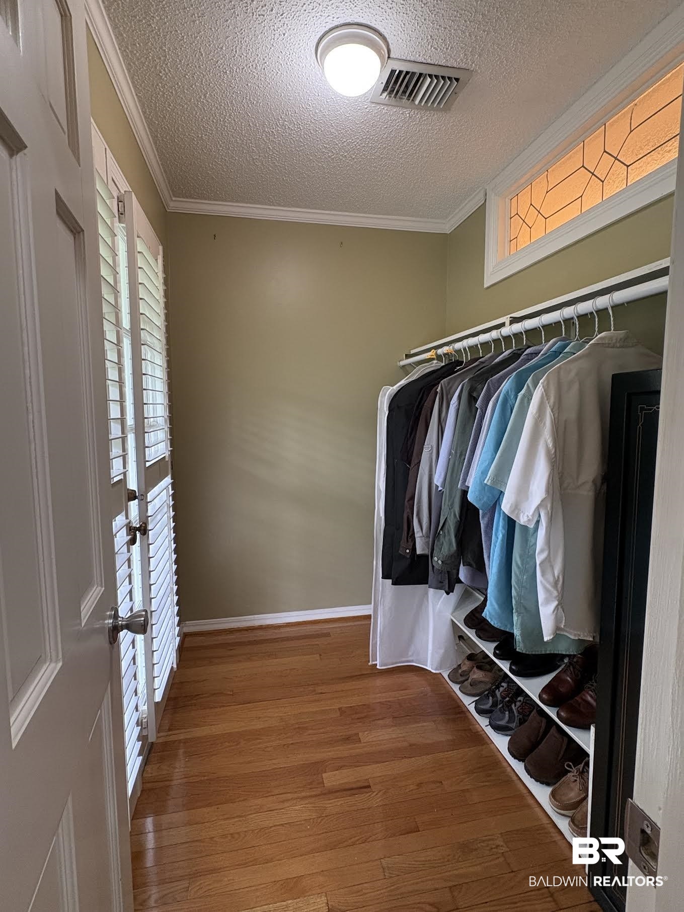 6105 Brandy Run Road South Mobile, AL 36608 - Photo 28 of 45 Walk in closet with wood finished floors