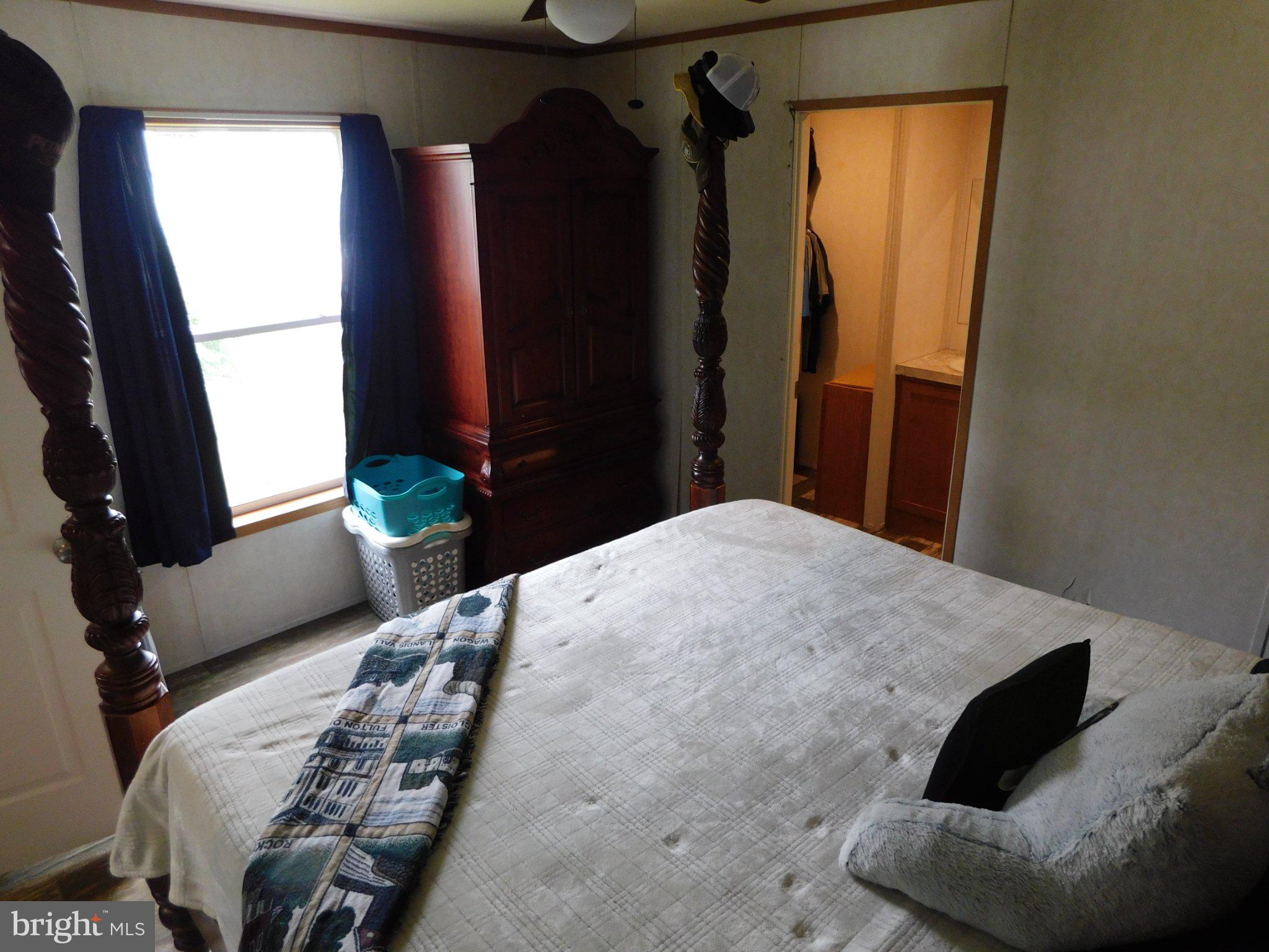 119 Meadow Lane Lititz, PA 17543 - Photo 6 of 13 a bedroom with a bed and a window
