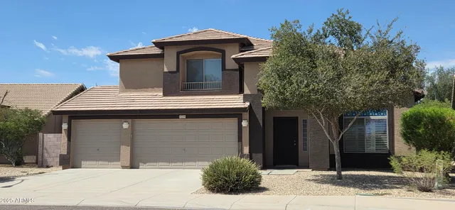 a house view with a outdoor space