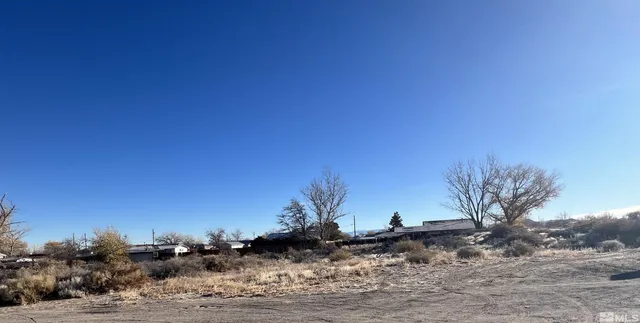 a view of a backyard of a house