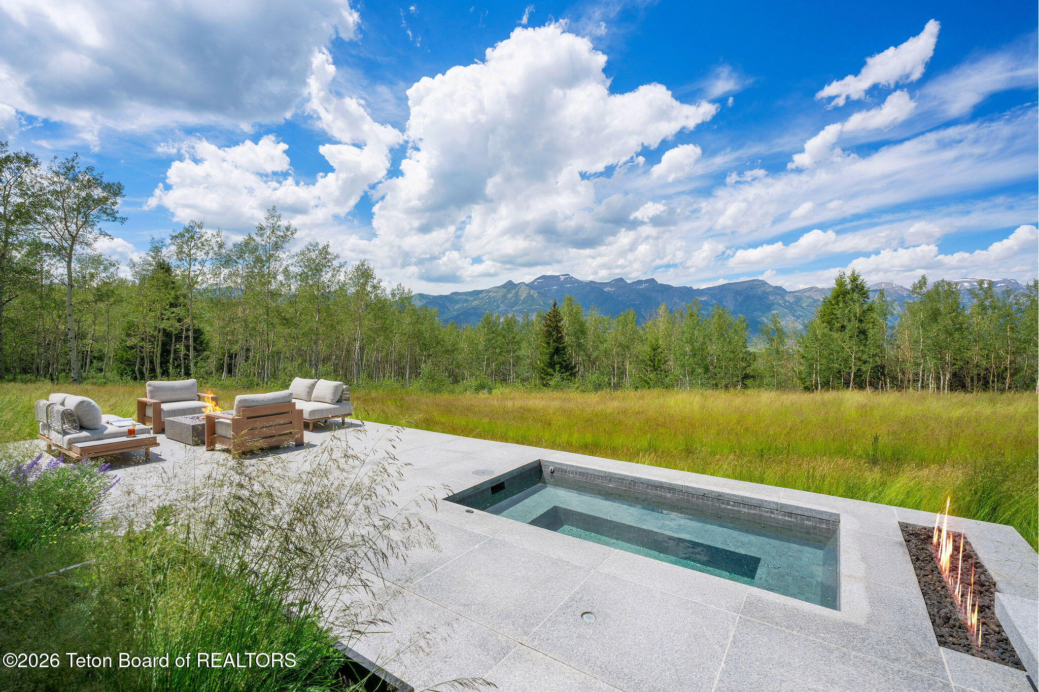 2005 West Bannock Road Jackson, WY 83001 - Photo 91 of 141 North patio with hot tub