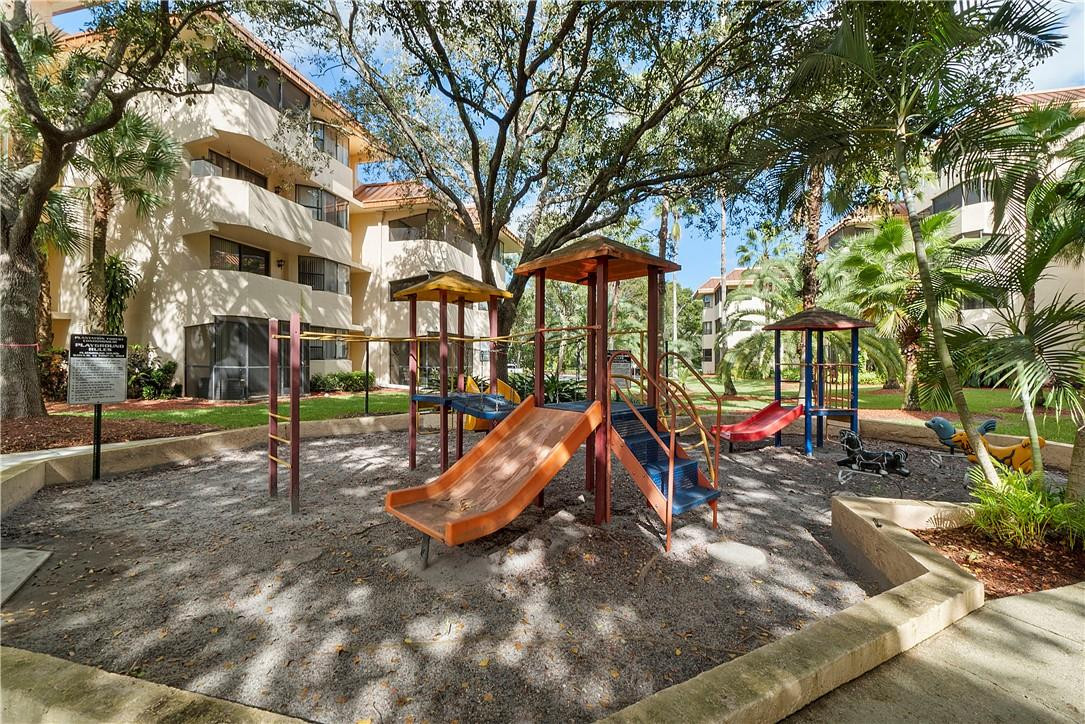 7401 Northwest 16th Street, Unit 103 Plantation, FL 33313 - Photo 11 of 12 a view of outdoor space with seating